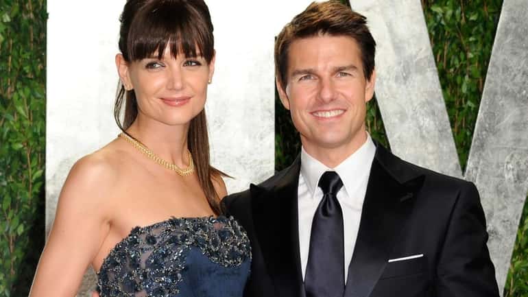 Katie Holmes and Tom Cruise arrive at the Vanity Fair...