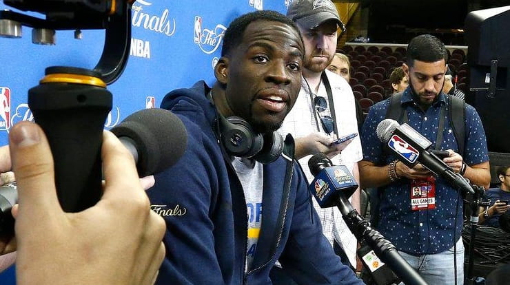 Draymond Green of the Golden State Warriors speaks to the...