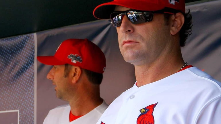 St. Louis Cardinals manager Mike Matheny looks on in the...