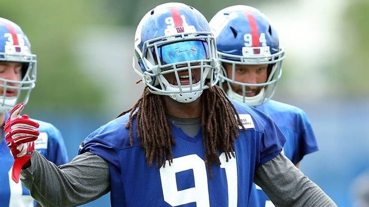 Giants linebacker Kelvin Sheppard calls to the defense during practice...