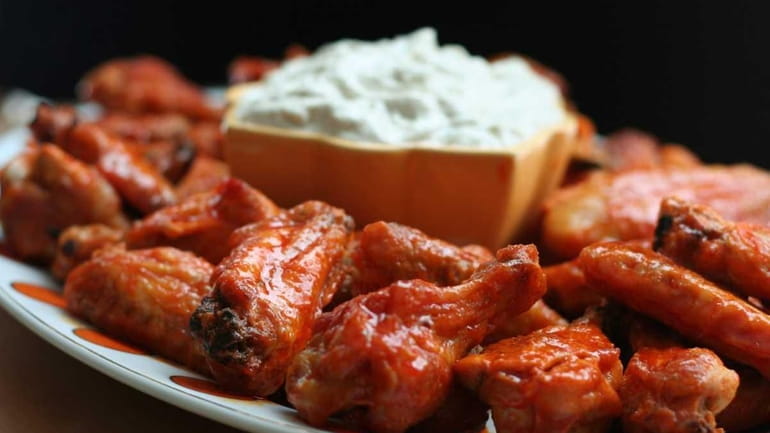 Buffalo wings with blue cheese dip