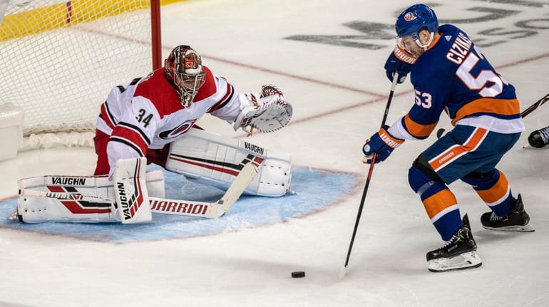 The Islanders' Casey Cizikas could not get the puck past...