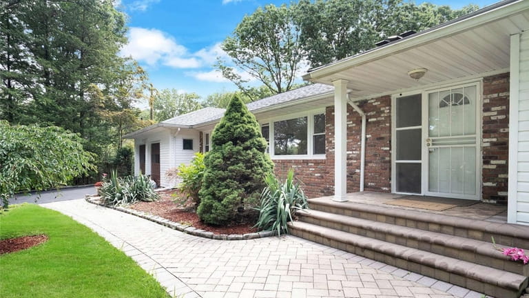 This four-bedroom ranch on 1.46 acres in Dix Hills is...