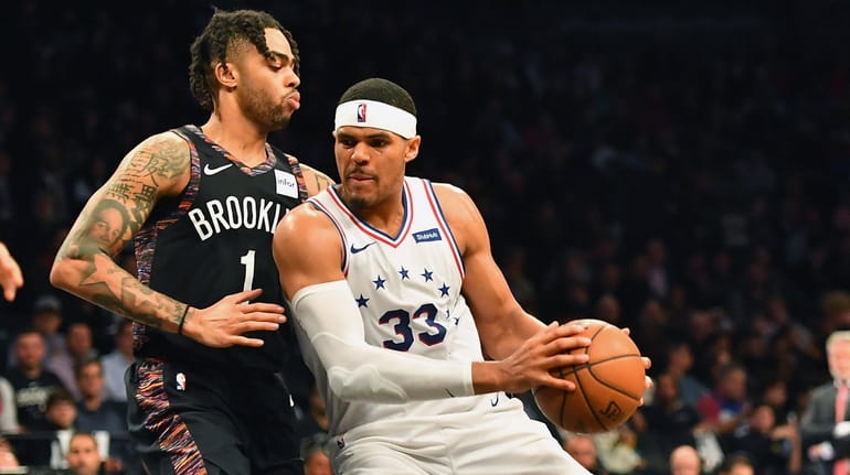 Tobias Harris drives against D'Angelo Russell. Could they be Nets...