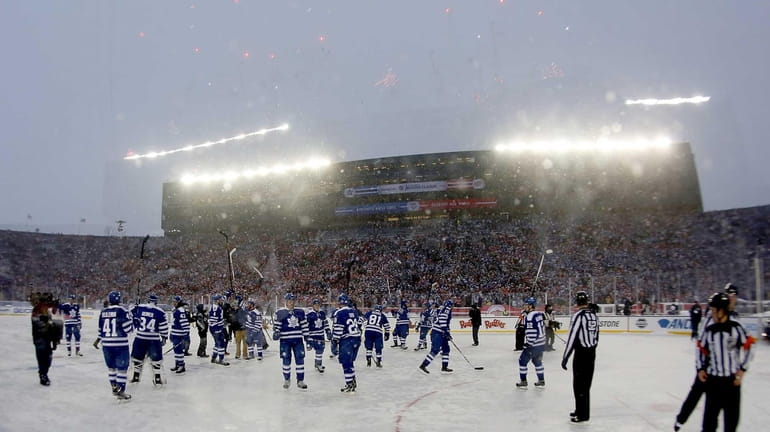 Fireworks go off as the Toronto Maple Leafs celebrate a...