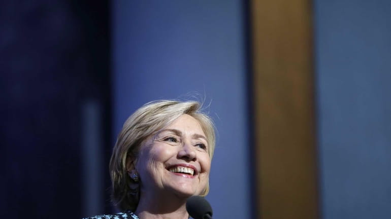 Former Secretary of State Hillary Rodham Clinton, smiles as she...