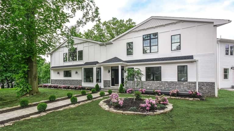 Priced at $2.199 million, this new construction on Hazel Road...