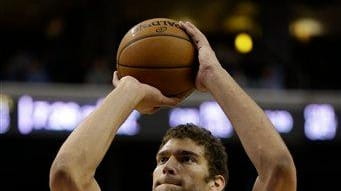 Brook Lopez takes a shot during a game against the...