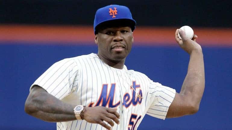 50 Cent throws out the ceremonial first pitch before a...