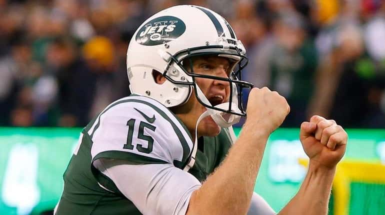 Jets quarterback Josh McCown reacts after a two-point conversion late...