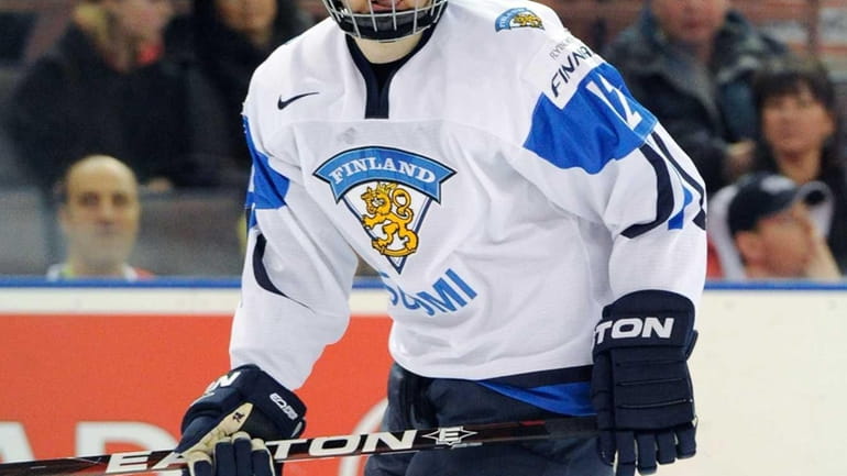 Ville Pokka of Team Finland skates during the 2012 World...
