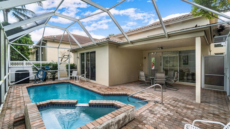 Priced at $399,900, this remodeled three-bedroom, three-bath house in Delray...