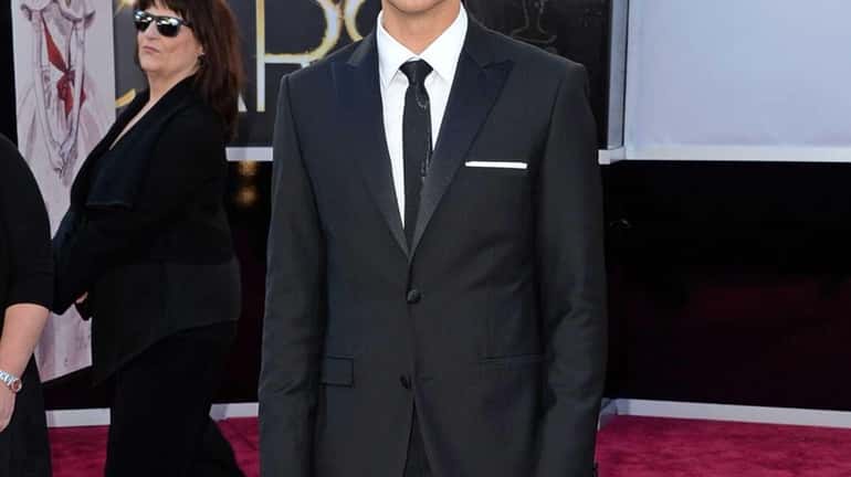 Aaron Tveit arrives at the Oscars at Hollywood & Highland...