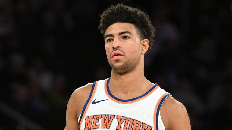 Knicks guard Quentin Grimes looks on against the Washington Wizards...