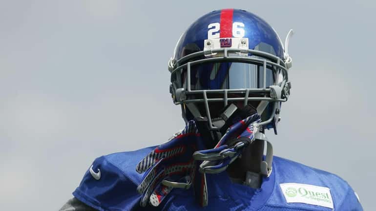 Antrel Rolle of the Giants looks on during training camp...