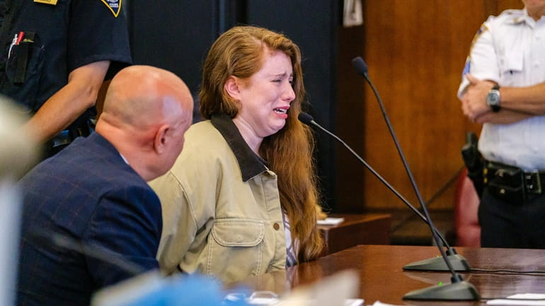 Lauren Pazienza weeps as she speaks at her sentencing in...