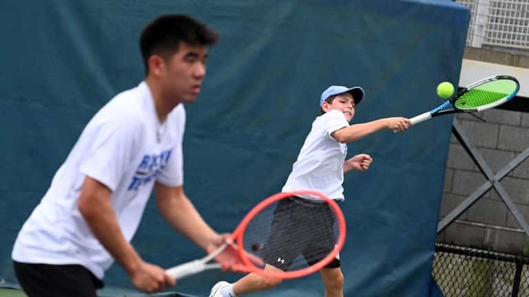 Drew Hassenbein, right, and Gavin Koo from Roslyn in the state championships...