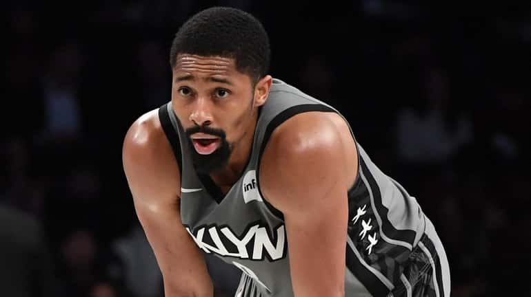 Nets guard Spencer Dinwiddie looks on against the Pacers during...