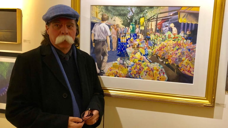 Denis Ponsot with one of his paintings at a show...
