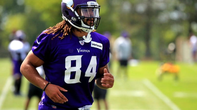 Then-Minnesota Vikings tight end Bucky Hodges (84) runs practice during...