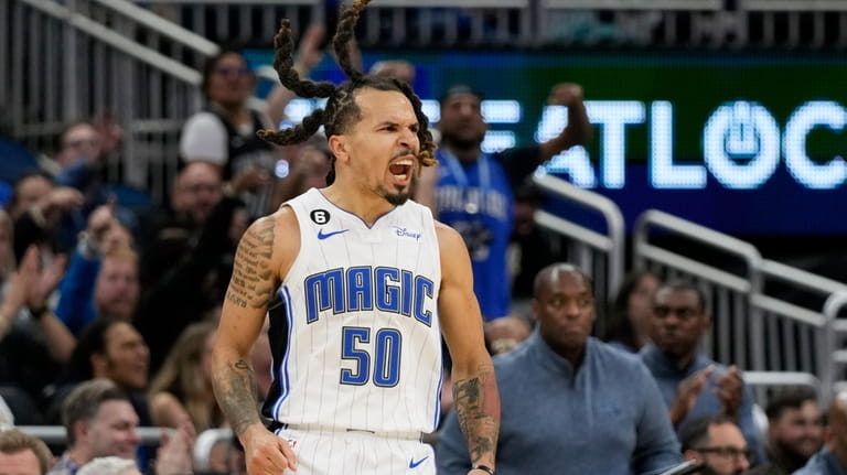 Orlando Magic's Cole Anthony reacts after sinking a 3-point shot...
