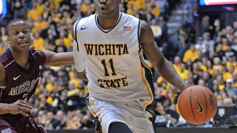 Forward Cleanthony Early of the Wichita State Shockers drives to...
