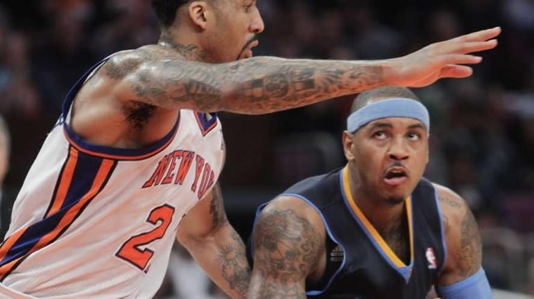 In this Dec. 12, 2010, photo, Denver Nuggets' Carmelo Anthony,...