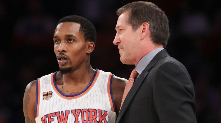 Brandon Jennings of the New York Knicks talks with head...