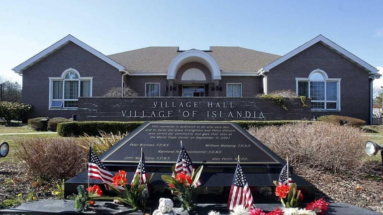 Islandia Village hall and the memorial to lost firefighters and...