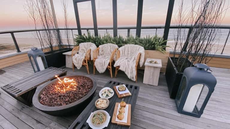 Gurney's Montauk has outdoor dining with fire pits to keep...