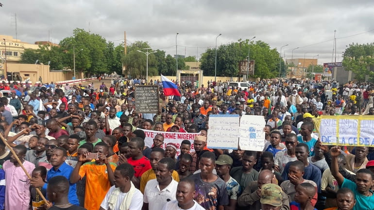 Supporters of Niger's ruling junta, gather for a protest called...