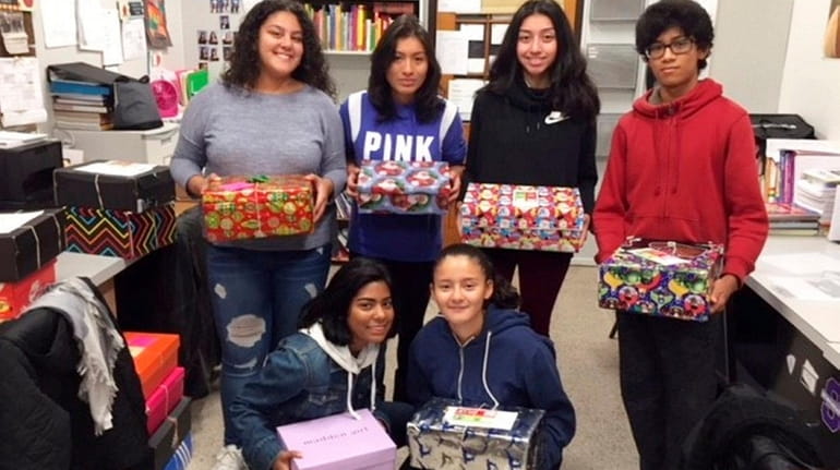Sewanhaka High School's World Languages Honor Society collected gifts for...