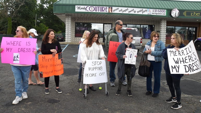 Protesters outside Merrily Couture prom dress boutique store in Mount...