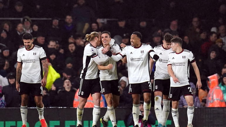 Fulham's Joao Palhinha celebrates scoring their side's second goal of...