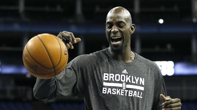 Nets' Kevin Garnett practices during a training session at the...