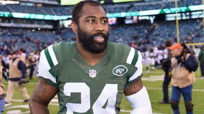 New York Jets cornerback Darrelle Revis leaves the field after...