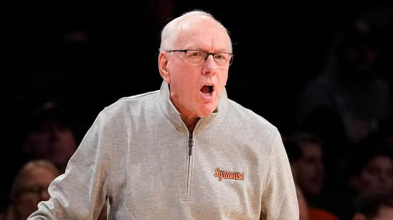 Syracuse head coach Jim Boeheim works the bench in the...