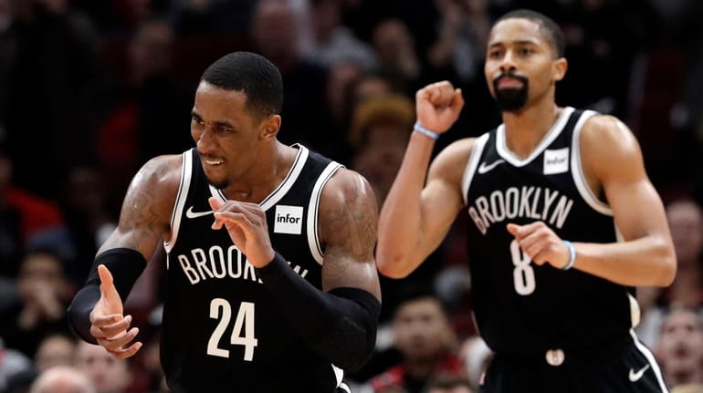 Nets forward Rondae Hollis-Jefferson, left, and guard Spencer Dinwiddie against...