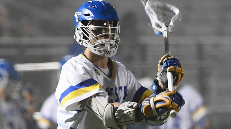 Hofstra attacker Josh Byrne looks to pass the ball against...