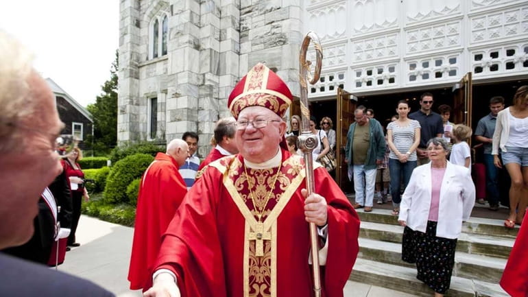 Bishop William Murphy greets well-wishers at the Basilica Church of...
