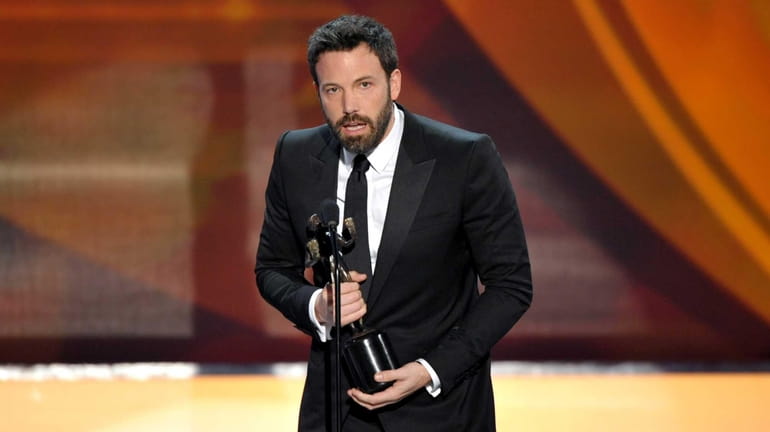 Ben Affleck accepts the award for outstanding cast in a...