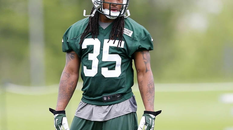 Safety Calvin Pryor of the Jets looks on during the...