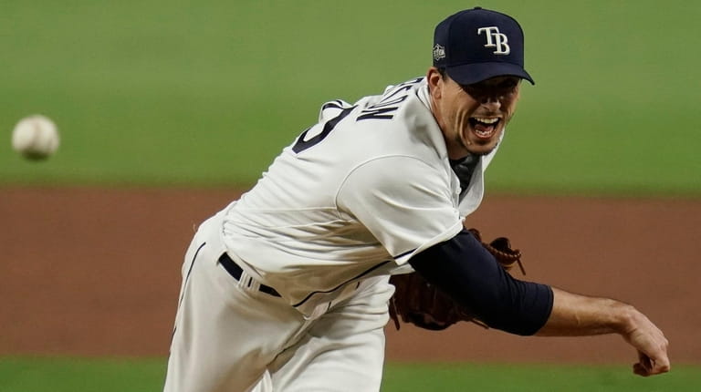Rays starting pitcher Charlie Morton throws against the Astros during the...