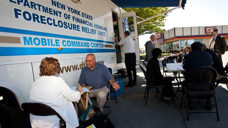 A Financial Services Foreclosure Prevention mobile center makes a stop...