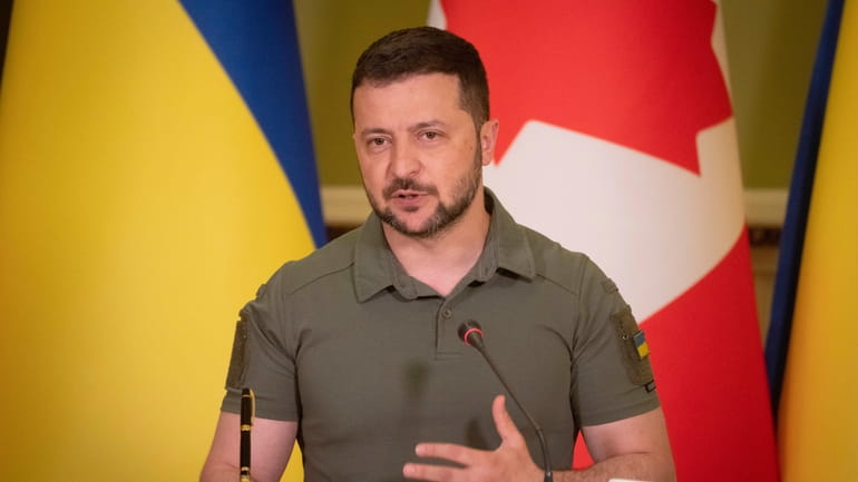 Ukrainian President Volodymyr Zelenskyy speaks during joint press conference with...