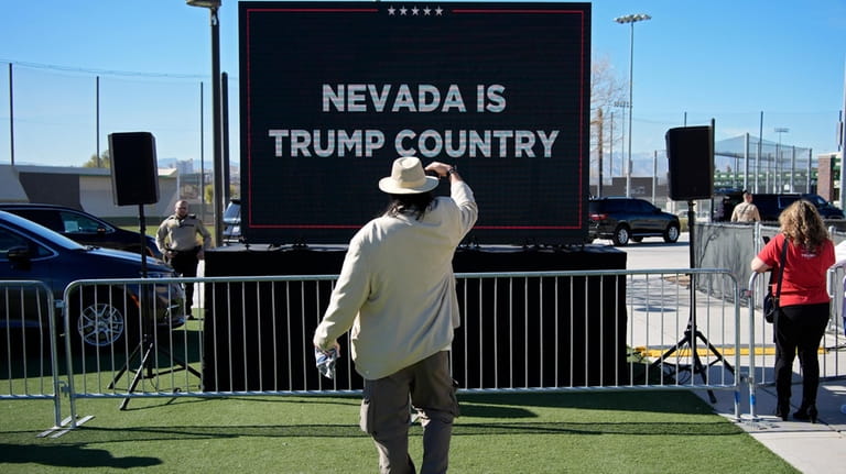 A person takes a picture of a screen before Republican...