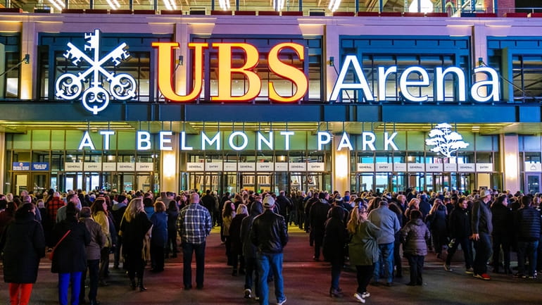 Billy Joel fans wait to enter UBS Arena for his New Year's...