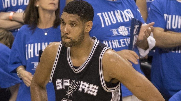 Tim Duncan of the San Antonio Spurs waits for the...