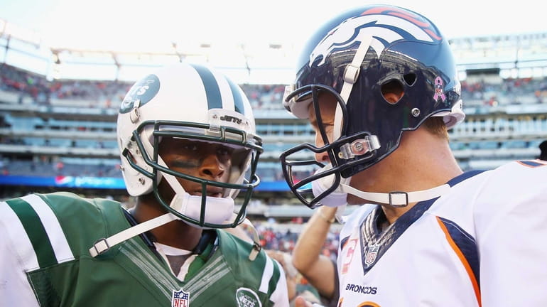 Jets quarterback Geno Smith and Denver Broncos quarterback Peyton Manning...