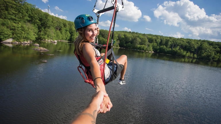 Guests at Mountain Creek and try zip lining and more...